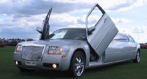 Chauffeur stretch silver Chrysler C300 Baby Bentley limousine hire with Lamborghini doors in Leeds, Bradford, Huddersfield, West Yorkshire.