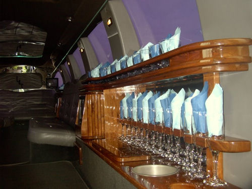 Chauffeur stretch Lincoln Navigator limo hire interior in UK