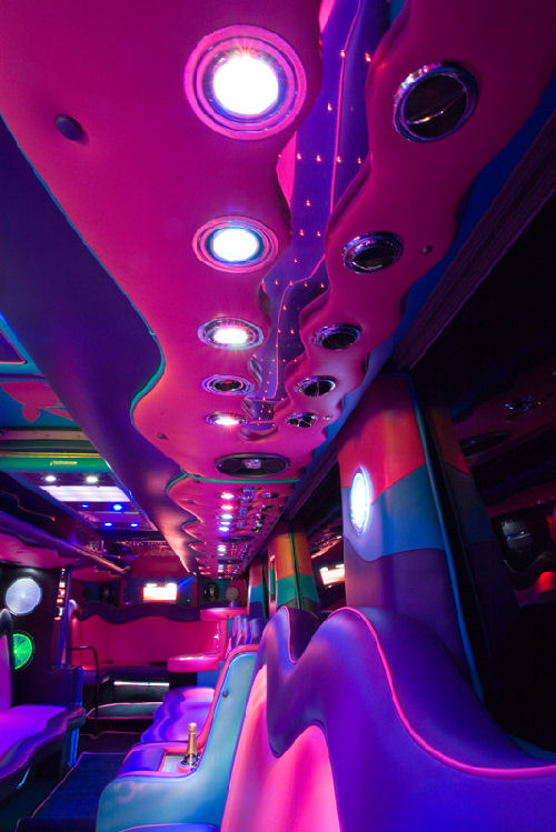 Chauffeur driven Party Bus limousine hire interior in Bristol, Gloucester, Cheltenham, Cardiff, Wales, Weston Super Mare, and Bath.