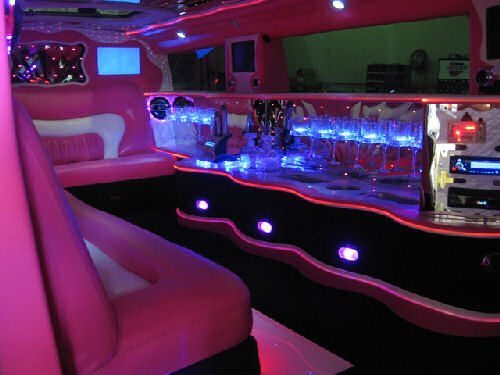 Chauffeur stretched pink Hummer H2 limo hire interior in Newcastle, Sunderland, Durham, and North East