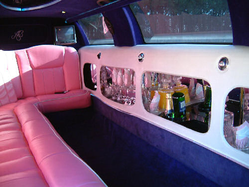 Chauffeur stretched pink Lincoln limousine hire interior in Sheffield, Rotherham, Doncaster, Chesterfield, South Yorkshire