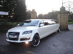 Chauffeur stretch silver Audi Q7 limo hire in Nottingham, Derby, Leicester, Birmingham Leeds, Bradford, London, Nottinghamshire, Derbyshire, West Yorkshire, South Yorkshire Midlands.