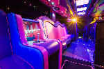 Chauffeur driven Party Bus limousine hire interior in Bristol, Gloucester, Cheltenham, Cardiff, Wales, Weston Super Mare, and Bath.